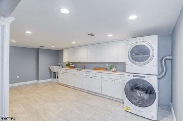 106 Woodbine Cir, New Providence Boro, NJ 07974 - washroom with stacked washer and clothes dryer, recessed lighting, and cabinet space