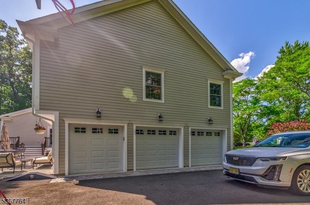 106 Woodbine Cir, New Providence Boro, NJ 07974 - view of property exterior featuring an attached garage
