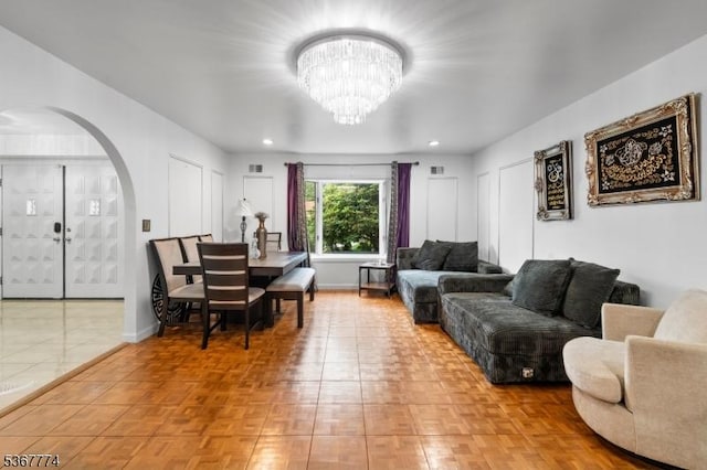 5 Peppermint Hill Rd, North Brunswick Twp, NJ 08902 - living room with arched walkways and a chandelier