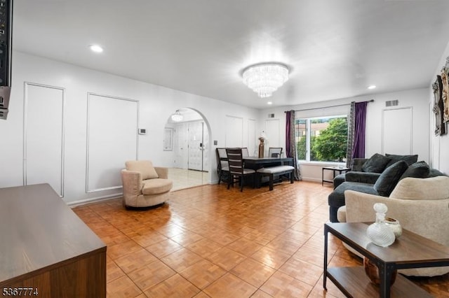 5 Peppermint Hill Rd, North Brunswick Twp, NJ 08902 - living room with arched walkways and a chandelier