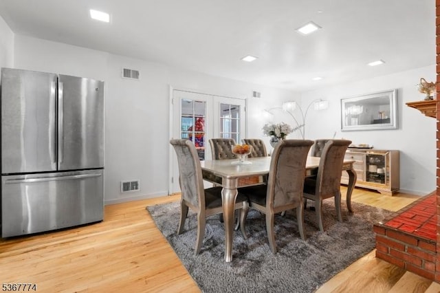 5 Peppermint Hill Rd, North Brunswick Twp, NJ 08902 - dining room featuring light wood finished floors and french doors