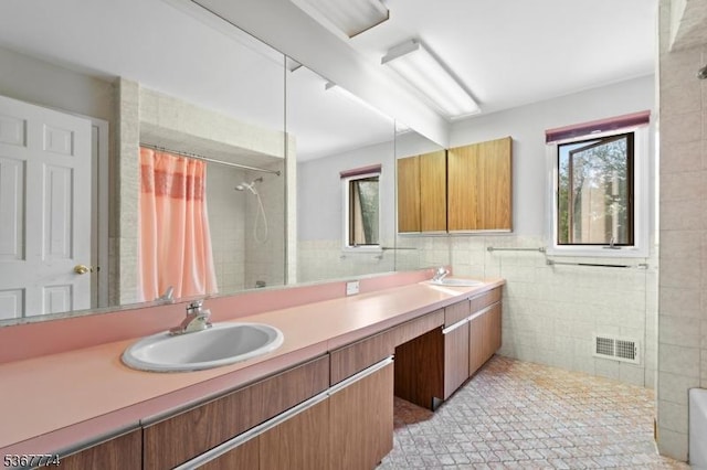 5 Peppermint Hill Rd, North Brunswick Twp, NJ 08902 - full bathroom with tile walls, a tile shower, and double vanity
