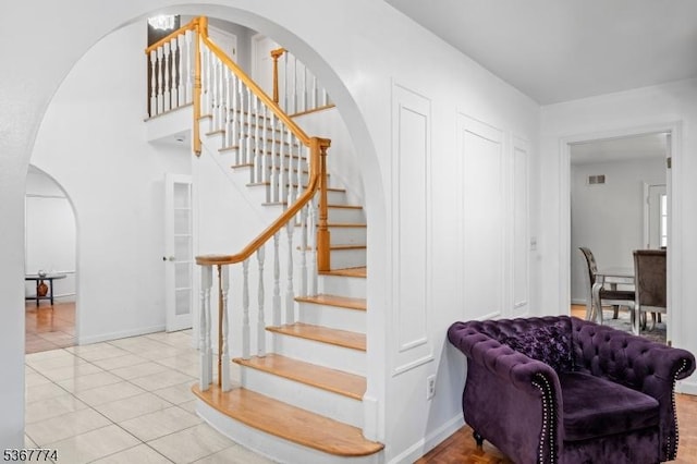 5 Peppermint Hill Rd, North Brunswick Twp, NJ 08902 - stairway featuring arched walkways and tile patterned floors