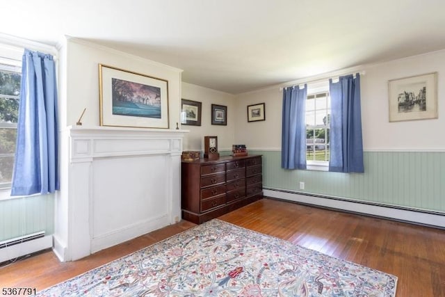 30 Bissell Rd, Tewksbury Twp, NJ 08833 - bedroom featuring baseboard heating, wood finished floors, wainscoting, and ornamental molding