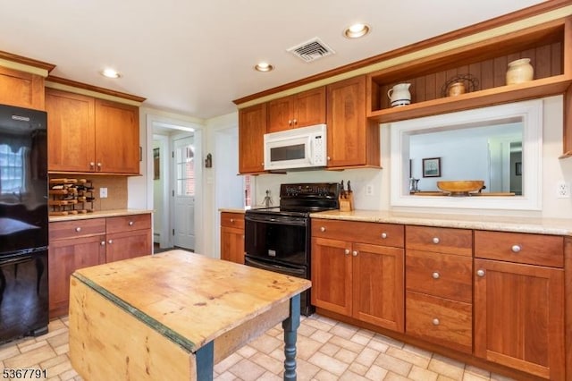 30 Bissell Rd, Tewksbury Twp, NJ 08833 - kitchen with black appliances, brown cabinetry, recessed lighting, open shelves, and a kitchen island