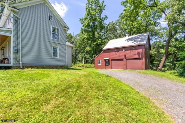 30 Bissell Rd, Tewksbury Twp, NJ 08833 - view of home's exterior featuring a lawn, a garage, an outdoor structure, and a barn