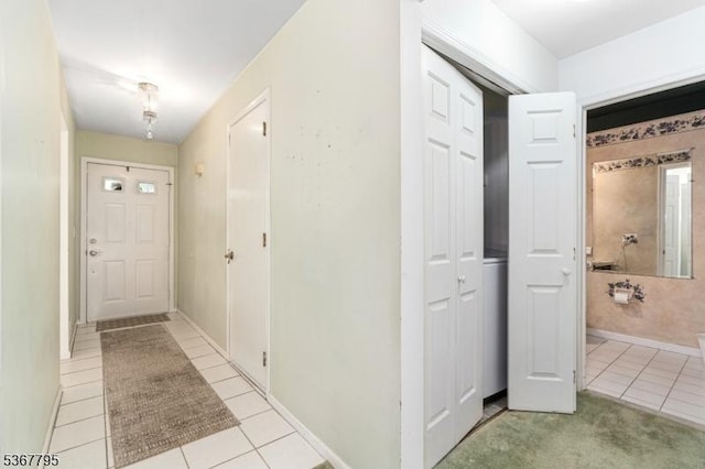42 Carriage Ln, Sparta Twp, NJ 07871 - corridor featuring tile patterned flooring and baseboards