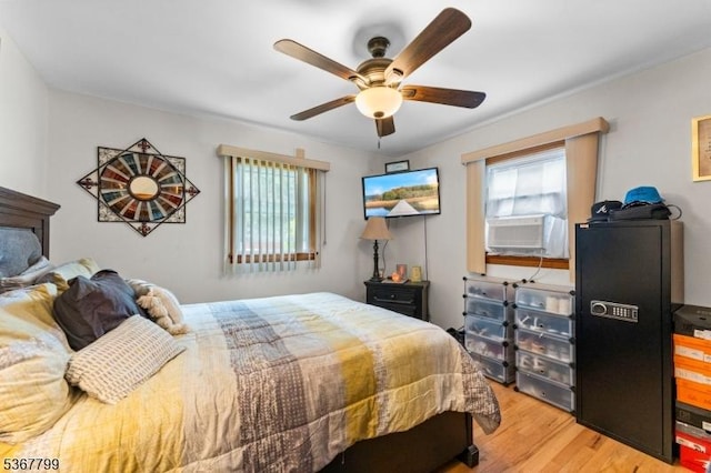 947 Boesel Ave, Manville Boro, NJ 08835 - bedroom with light wood finished floors and ceiling fan