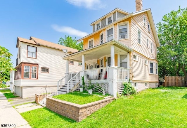 1705 Essex St, Rahway City, NJ 07065 - view of front of home featuring covered porch and a chimney
