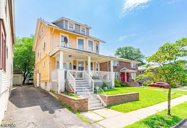 1705 Essex St, Rahway City, NJ 07065 - american foursquare style home with covered porch and a front lawn