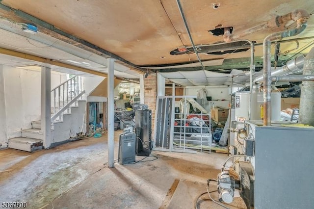 1705 Essex St, Rahway City, NJ 07065 - basement featuring stairway and water heater