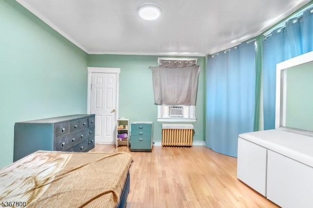 1705 Essex St, Rahway City, NJ 07065 - bedroom with radiator, light wood-type flooring, crown molding, and cooling unit