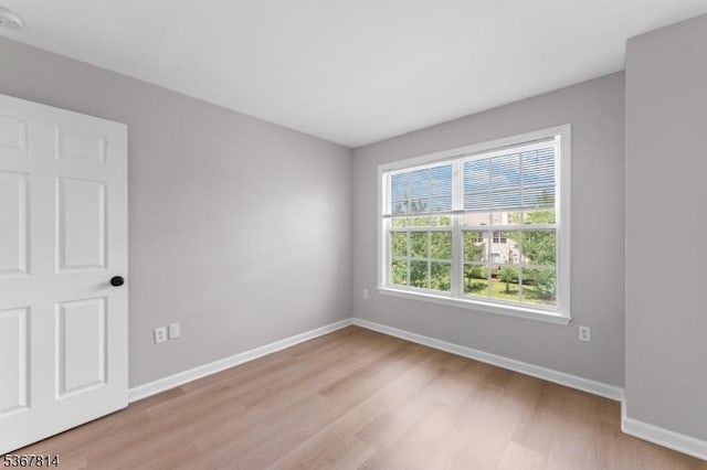 16 Edith Dr, Franklin Twp, NJ 08873 - spare room featuring light wood-style floors and a smoke detector