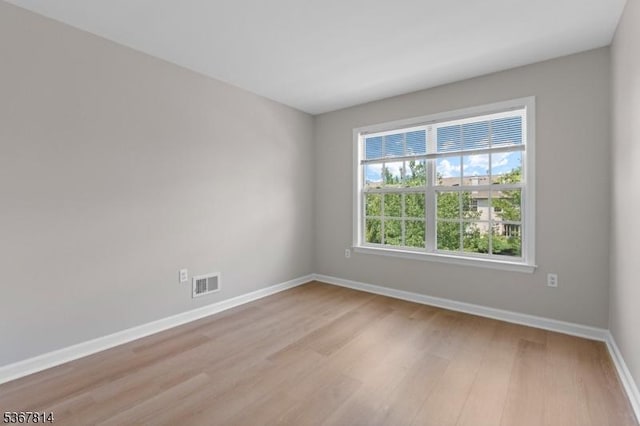 16 Edith Dr, Franklin Twp, NJ 08873 - empty room with light wood-style flooring and baseboards