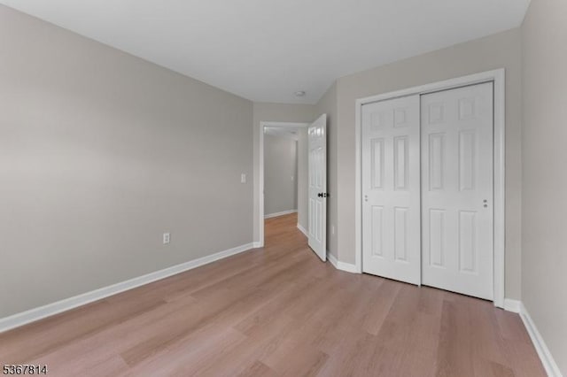 16 Edith Dr, Franklin Twp, NJ 08873 - unfurnished bedroom with light wood-style flooring and a closet