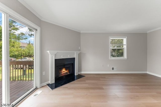 16 Edith Dr, Franklin Twp, NJ 08873 - unfurnished living room with light wood-style floors, a high end fireplace, and crown molding