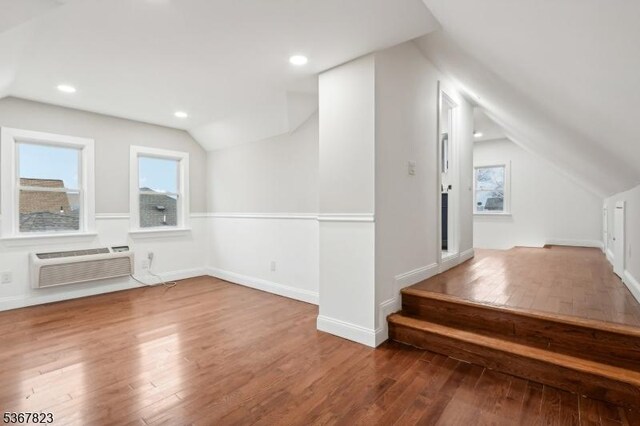 621 Roosevelt Ave, Carteret Boro, NJ 07008 - bonus room with vaulted ceiling, hardwood / wood-style floors, a wall mounted air conditioner, and recessed lighting