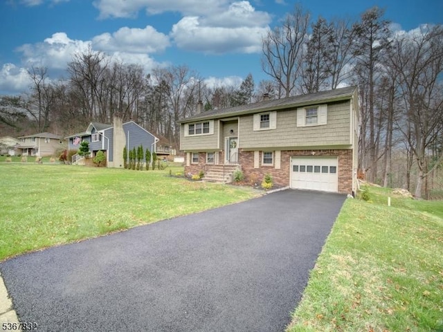 10 Hemlock Dr, Franklin Boro, NJ 07416 - bi-level home with a garage, asphalt driveway, brick siding, a front yard, and a chimney