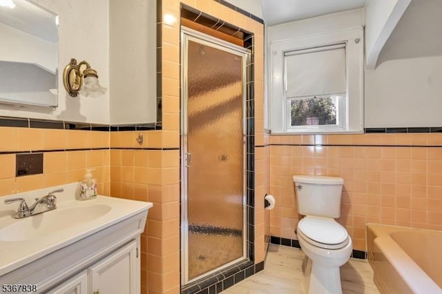 173 Raab Ave, Bloomfield Twp, NJ 07003 - full bath with tile walls, a shower stall, vanity, a wainscoted wall, and a tub to relax in