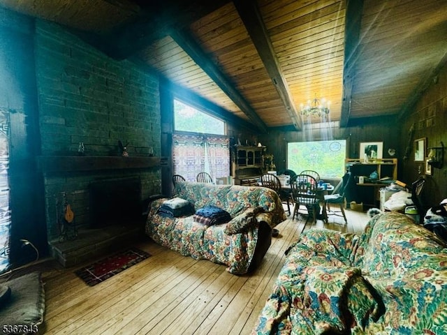 15 Plotts Rd, Hampton Twp, NJ 07860 - living room with hardwood / wood-style flooring, wooden ceiling, a large fireplace, and a chandelier