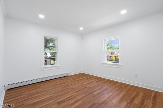 19 Pleasant View Ave, Washington Twp, NJ 07882 - unfurnished room with a baseboard heating unit, plenty of natural light, wood finished floors, and recessed lighting
