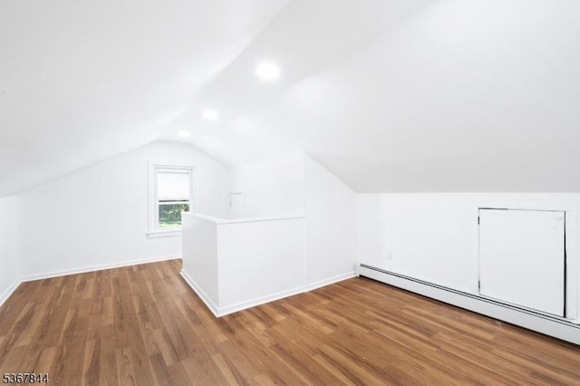 19 Pleasant View Ave, Washington Twp, NJ 07882 - additional living space featuring a baseboard radiator, lofted ceiling, and wood finished floors