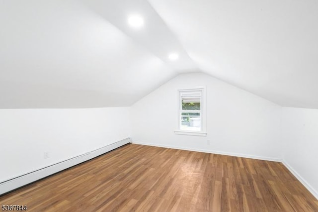 19 Pleasant View Ave, Washington Twp, NJ 07882 - bonus room featuring a baseboard heating unit, wood finished floors, lofted ceiling, and recessed lighting