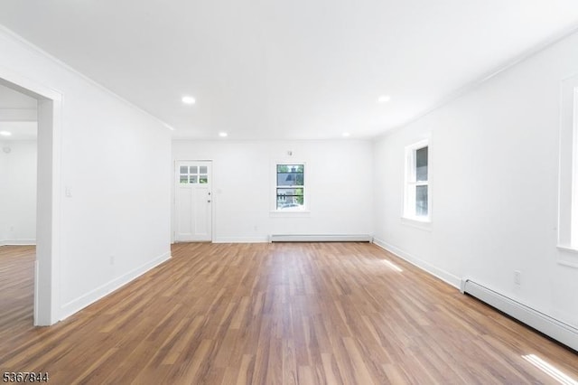 19 Pleasant View Ave, Washington Twp, NJ 07882 - spare room featuring a baseboard radiator, wood finished floors, and recessed lighting