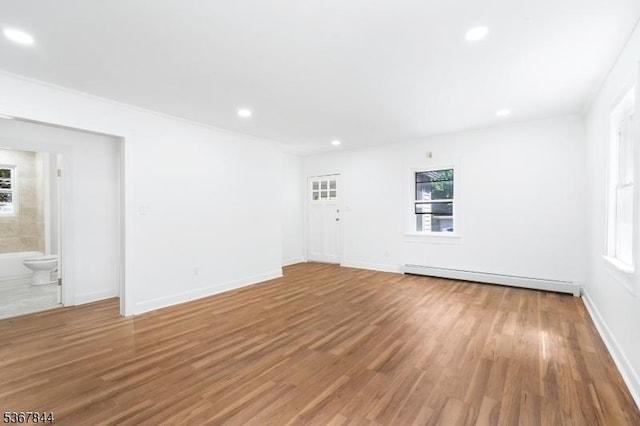 19 Pleasant View Ave, Washington Twp, NJ 07882 - spare room featuring baseboard heating, light wood-style flooring, and recessed lighting