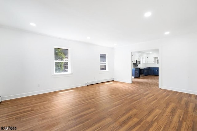 19 Pleasant View Ave, Washington Twp, NJ 07882 - unfurnished living room with a baseboard radiator, light wood finished floors, and recessed lighting