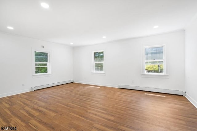 19 Pleasant View Ave, Washington Twp, NJ 07882 - unfurnished room featuring a baseboard radiator, plenty of natural light, and recessed lighting