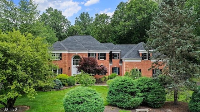 64 Sneider Rd, Warren Twp, NJ 07059 - colonial house with brick siding and a front lawn