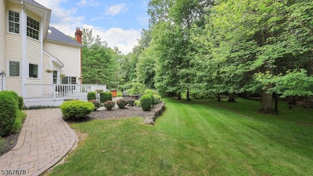 64 Sneider Rd, Warren Twp, NJ 07059 - view of green lawn featuring a deck