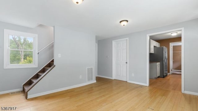 18 State Route 94, Blairstown Twp, NJ 07825 - unfurnished living room featuring light wood-style floors and stairway