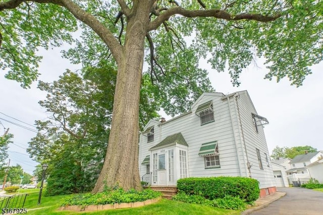 408 Sanford Ave, Hillside Twp, NJ 07205 - view of front facade with a garage