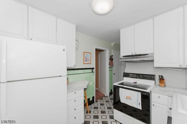 408 Sanford Ave, Hillside Twp, NJ 07205 - kitchen featuring white appliances, under cabinet range hood, white cabinetry, and light countertops