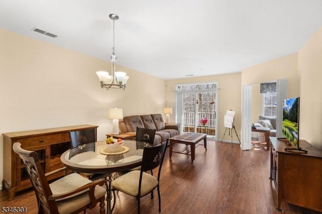 1208 Clinton Ln Unit 1208, Rockaway Twp, NJ 07866 - dining space featuring a chandelier and dark wood-style flooring