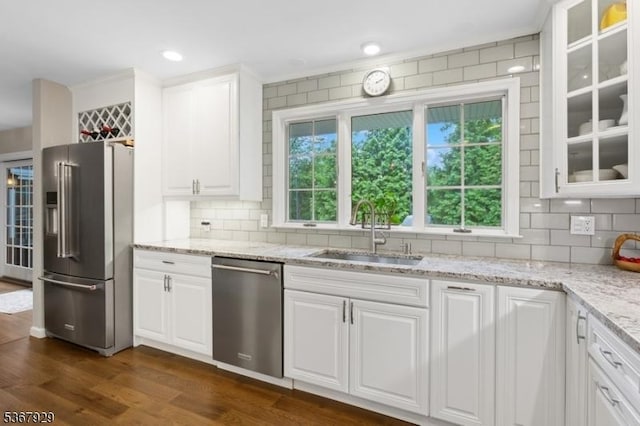 11 Old Farm Rd, North Caldwell Boro, NJ 07006 - kitchen featuring appliances with stainless steel finishes, white cabinetry, tasteful backsplash, and glass insert cabinets