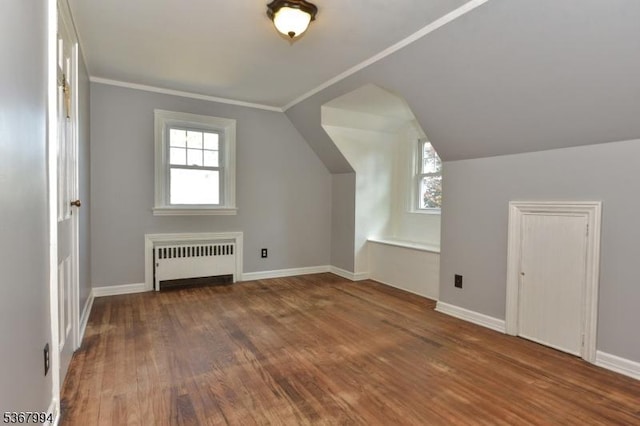 36 Grove St, Waldwick Boro, NJ 07463 - additional living space with radiator heating unit, wood finished floors, and lofted ceiling