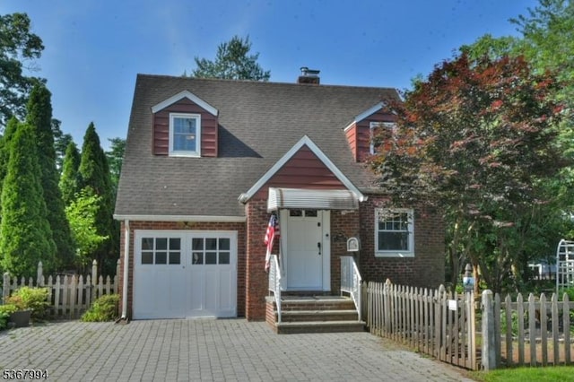 36 Grove St, Waldwick Boro, NJ 07463 - view of front of home featuring brick siding, decorative driveway, a chimney, a garage, and a shingled roof
