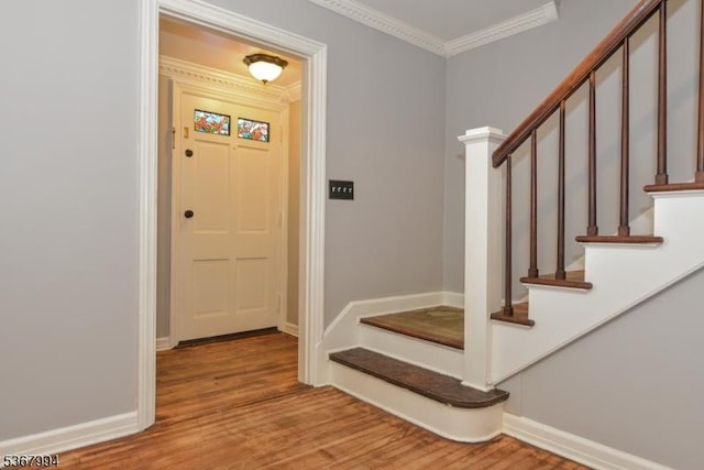 36 Grove St, Waldwick Boro, NJ 07463 - entryway with crown molding, wood finished floors, and stairway