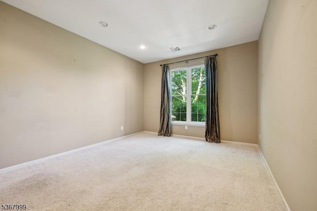 1407 Four Seasons Dr Unit 1407, Wayne Twp, NJ 07470 - spare room featuring light carpet and recessed lighting