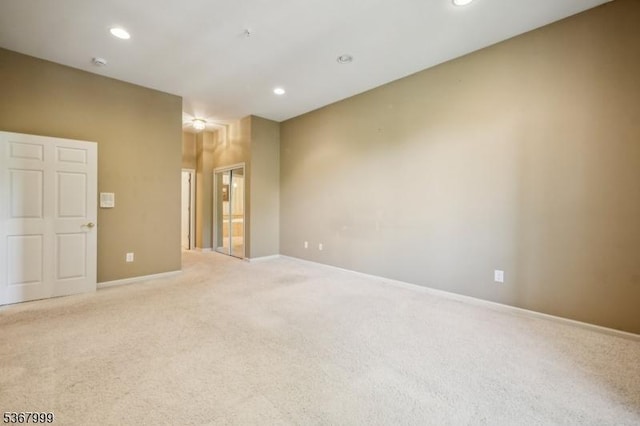 1407 Four Seasons Dr Unit 1407, Wayne Twp, NJ 07470 - empty room with light colored carpet, recessed lighting, and a smoke detector