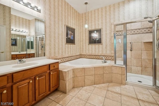 1407 Four Seasons Dr Unit 1407, Wayne Twp, NJ 07470 - full bath with vanity, a garden tub, a stall shower, wallpapered walls, and tile patterned floors