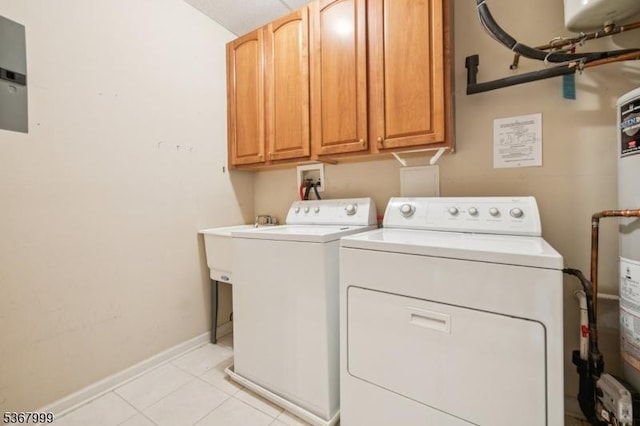 1407 Four Seasons Dr Unit 1407, Wayne Twp, NJ 07470 - laundry area featuring washer and dryer, cabinet space, and light tile patterned flooring