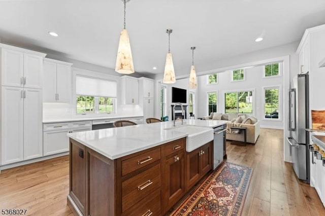 28 Peacock Ln Unit 28, Berkeley Heights Twp, NJ 07922 - kitchen featuring stainless steel appliances, white cabinetry, light wood-type flooring, and recessed lighting
