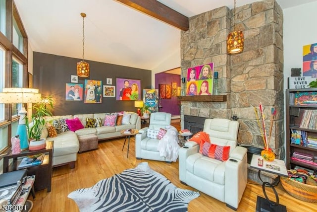 7 Deer Ct, Chester Twp, NJ 07930 - living room with a fireplace, wood finished floors, and a chandelier
