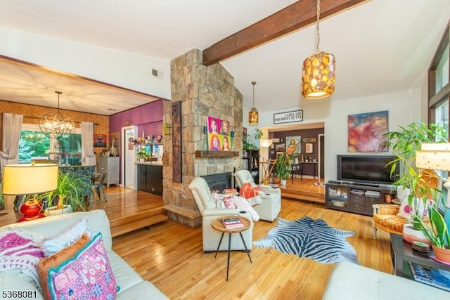 7 Deer Ct, Chester Twp, NJ 07930 - living area featuring a chandelier, wood finished floors, and a fireplace