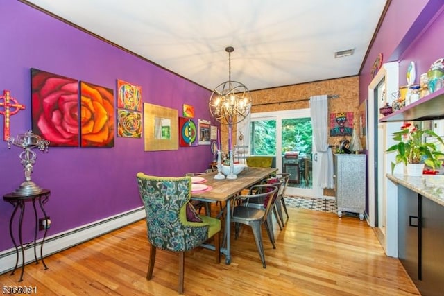 7 Deer Ct, Chester Twp, NJ 07930 - dining space with a baseboard heating unit, wood finished floors, and a chandelier