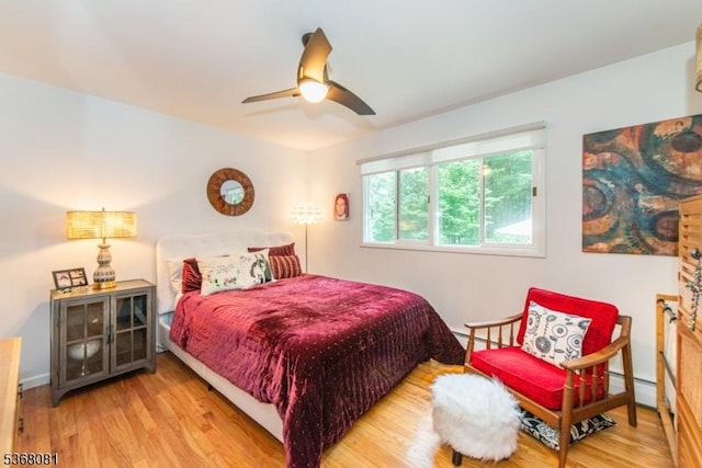 7 Deer Ct, Chester Twp, NJ 07930 - bedroom featuring wood finished floors, a baseboard heating unit, and ceiling fan